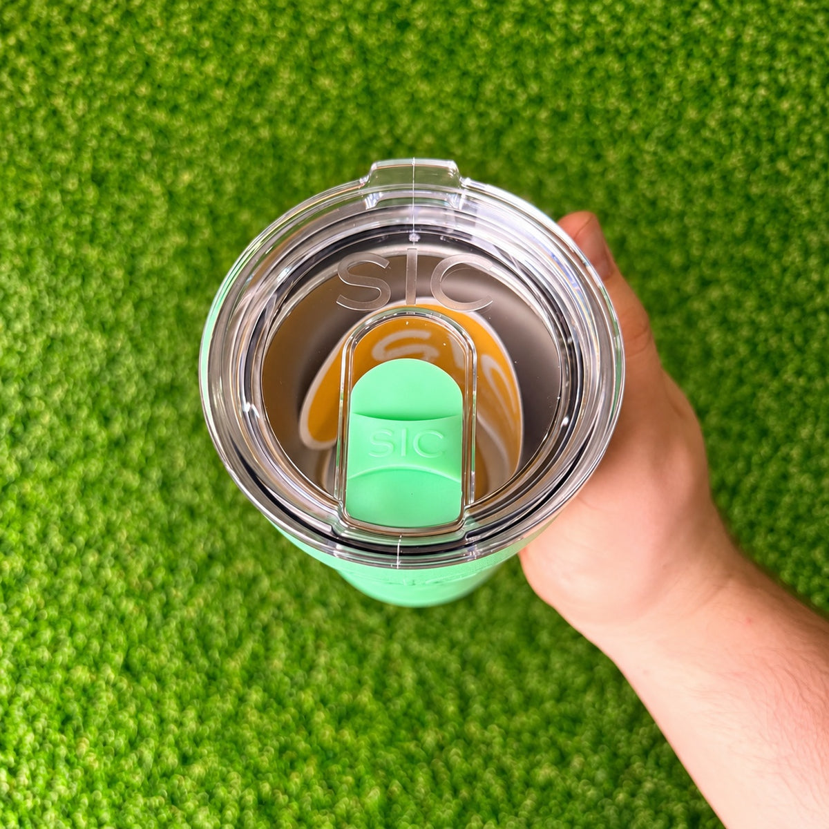 Top view of the clear lid and mint slider on a SIC Hammered Mint 12 oz. tumbler